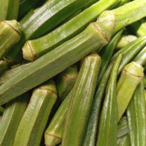 Close-up of fresh green okra at a market in Pune, India, showcasing vibrant natural textures.